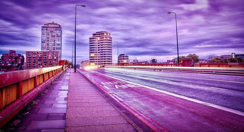 Surface level of empty road along buildings