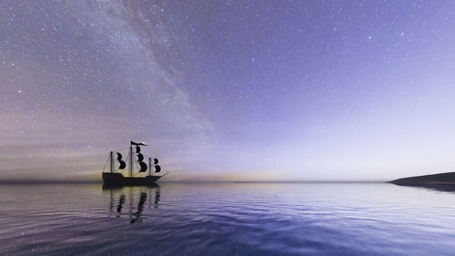 Scenic view of sea against sky at night