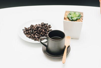 High angle view of coffee cup on table