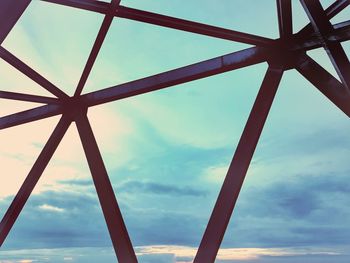 Low angle view of metallic structure against sky