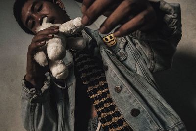 Close-up of man holding hands