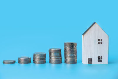 Stack of blue metal against white background