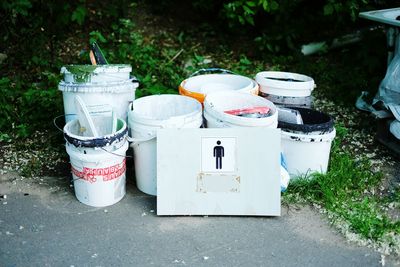 Close-up of paint tins