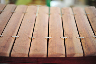 Close-up of piano keys on wooden table
