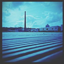 Built structure against cloudy sky