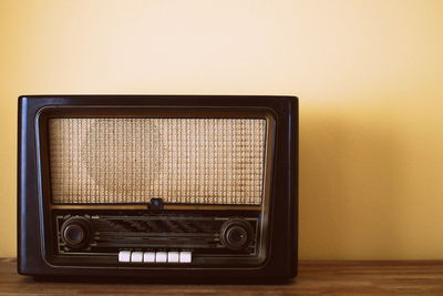 Close-up of radio on table