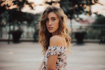 Young woman standing on street