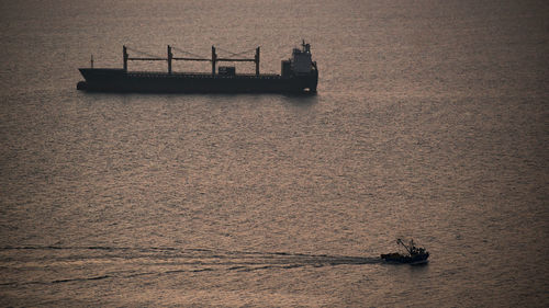 High angle view of container ship in sea