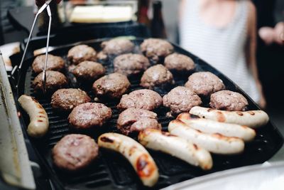 Close-up of meat on barbecue grill