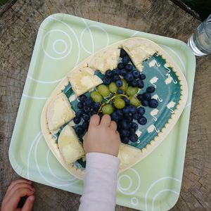 High angle view of hand holding fruits