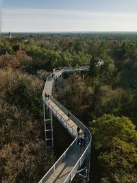 High angle view of stairs by river against sky