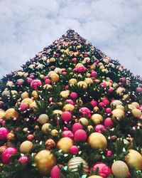 Low angle view of christmas tree against sky