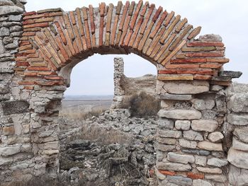 Old stone wall against sky