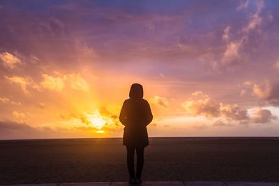 Scenic view of sea at sunset