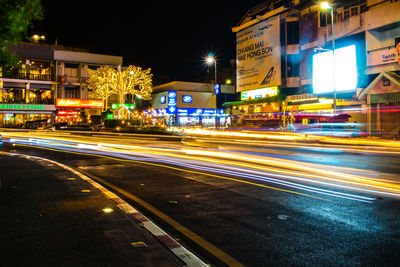 Light trails on city street at night