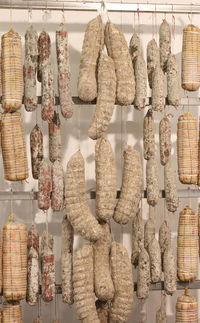 Lots of hanging salami during maturing in the food business