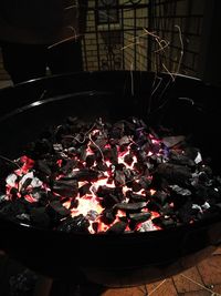 High angle view of leaves on barbecue grill