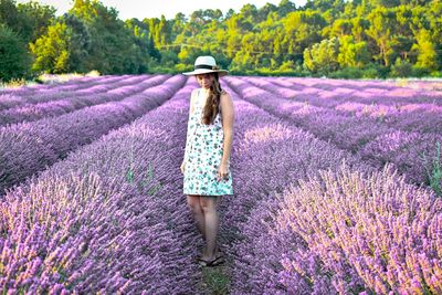 Full length of woman standing on field