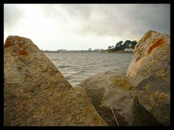 View of sea against cloudy sky