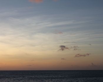 Scenic view of sea against sky at sunset