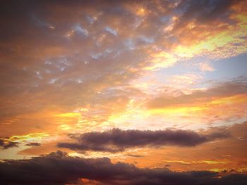 Scenic view of dramatic sky during sunset