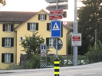 Information sign on road in city