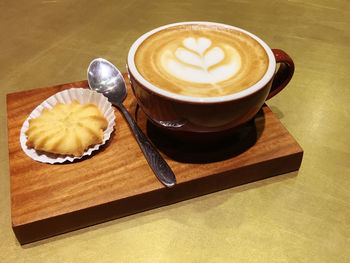 High angle view of cappuccino on table