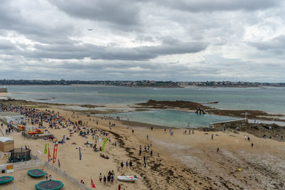 High angle view of people on beach against sky