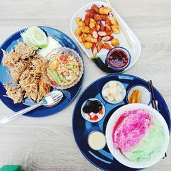 High angle view of breakfast served on table