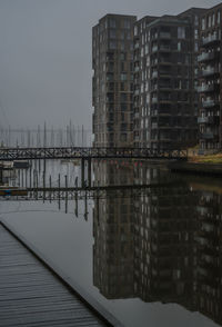 Residential houses at havneøen, vejle harbour in misty weather