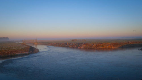 Scenic view of sea against clear sky