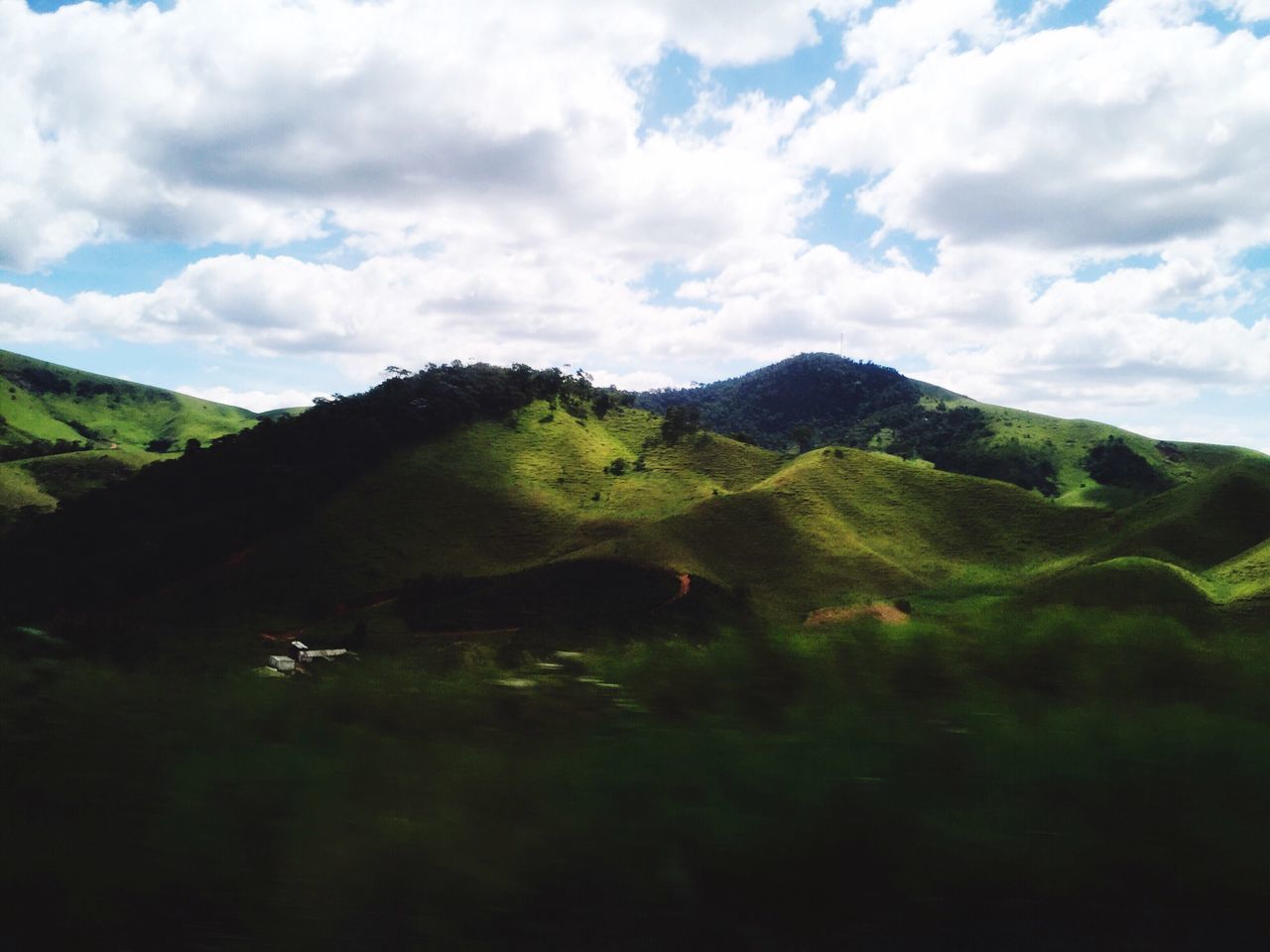 nature, sky, mountain, cloud - sky, beauty in nature, green color, tree, no people, landscape, tranquility, scenics, tranquil scene, growth, day, outdoors, backgrounds, grass, natural disaster