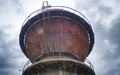 Low angle view of water tower against sky