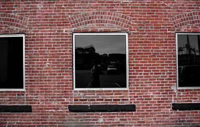Window on brick wall of building