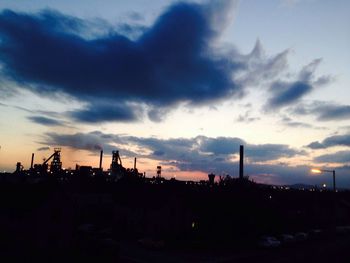 Built structure against sunset sky