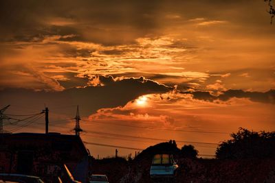 Scenic view of dramatic sky during sunset