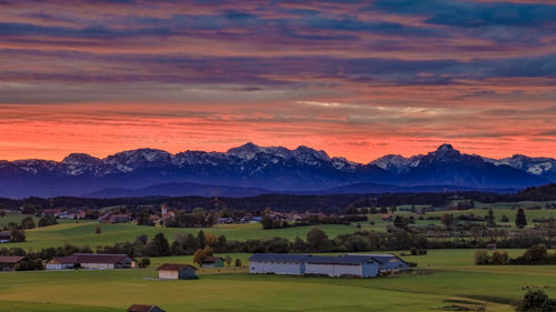 Scenic view of landscape against sky during sunset