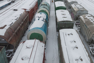 Top view of the freight cars and tank cars, which stand at the railway station