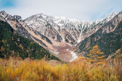Scenic view of mountains against sky during winter