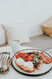 High angle view of breakfast served on table