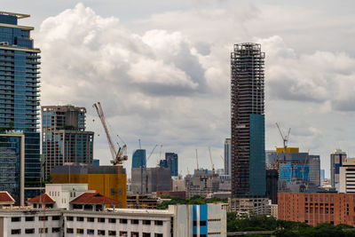 Bangkok, thailand - 12 august 2022 - view of bangkok cityscape high-rises and bts skytrains