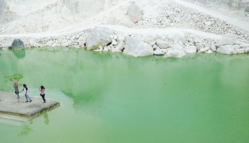 High angle view of people on lake