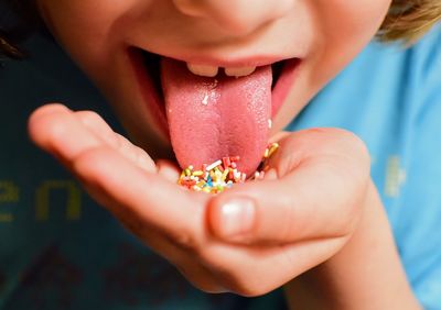 Boy eating sweets