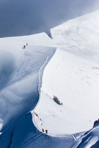 Scenic view of snow covered land