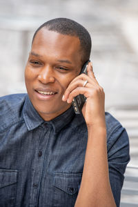 Portrait of smiling man looking away