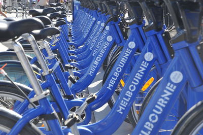 Close-up of bicycles parked in row