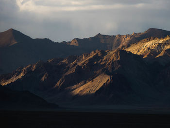 Panoramic view of mountain range against sky