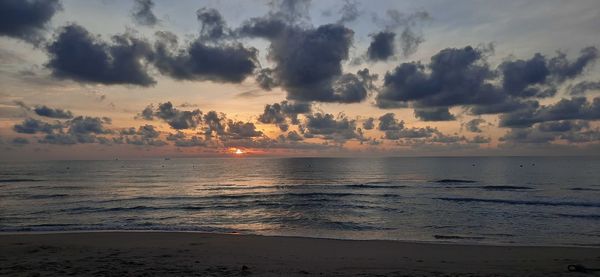 Scenic view of sea against sky during sunset