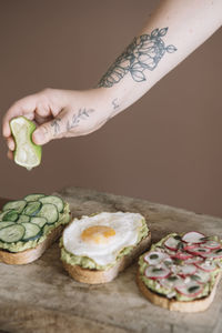 Midsection of woman preparing food