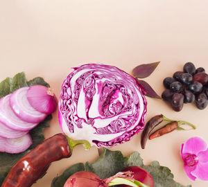 Healthy purple organic vegetables. creative minimalist close-up concept. flat lay